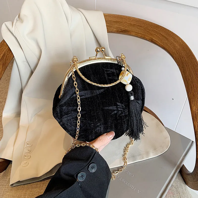 Elegant Velvet Handbag with Gold Chain and Tassel Decoration