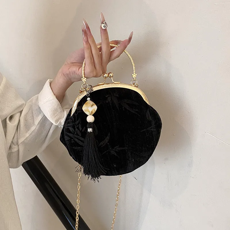 Elegant Velvet Handbag with Gold Chain and Tassel Decoration