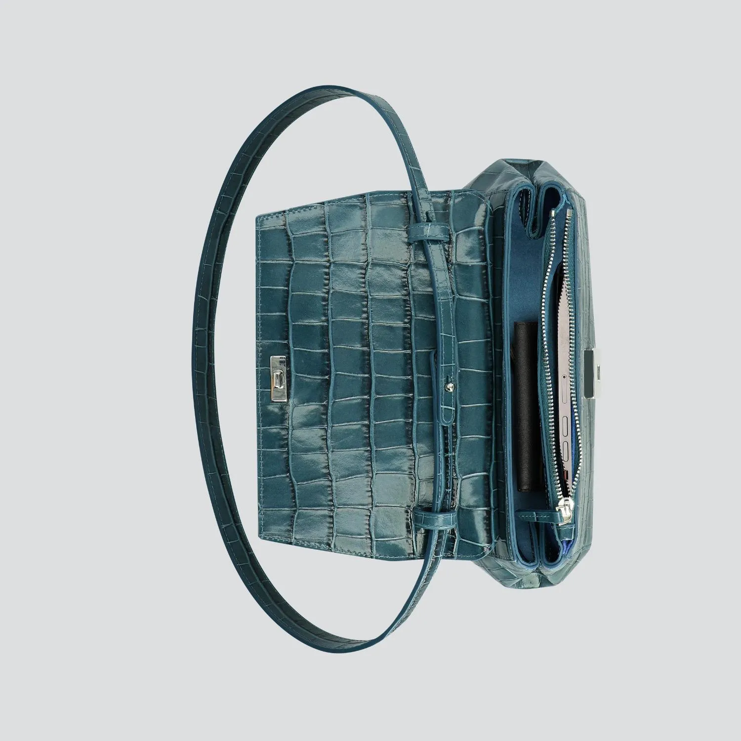 Ikon Clutch - croco dark teal
