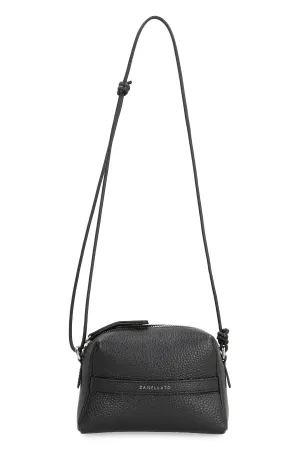 Matrioska leather clutch