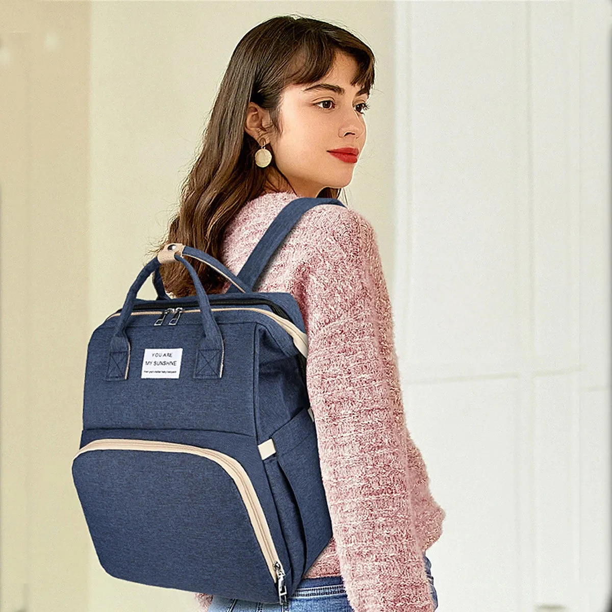 Travel Diaper Bag with Foldable Changing Station and Insulated Pocket for Parents on the Go